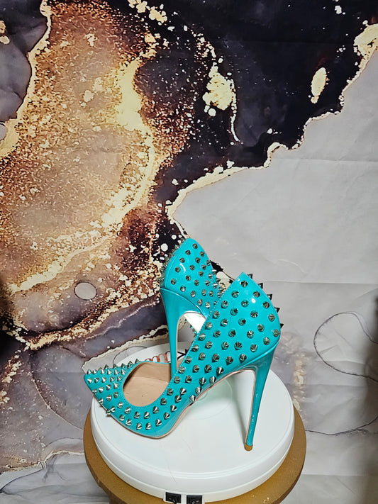 Size 8 green spiked heel